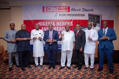 L-R: Mr Okezie Akaniro, Senior VP Konga, Mr. Chooks Okoh, Special Adviser (Media) to Gov Dave Umahi, Hon. Festus Agas, Chief of Staff to Gov Ifeanyi Okowa, Mr Hakeem Bello,  Media Adviser to Minister of Works and Housing; Hon. Declan Emelumba, Commissioner for Information and Strategy Imo State,  Mr. Ken Ugbechie (Author of the Book: Heroes and Sheroes); Mr. Femi Babafemi, Director, Media and Advocacy NDLEA , and Mr. Reuben Muoka, at the Political Economist Merit Award and Book Presentation in Lagos, Thursday.