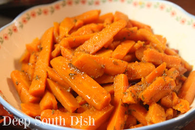 Carottes Glacées - a savory glazed carrot side dish, made from strips of carrots, slow boiled in beef stock with a little sugar and plenty of butter.
