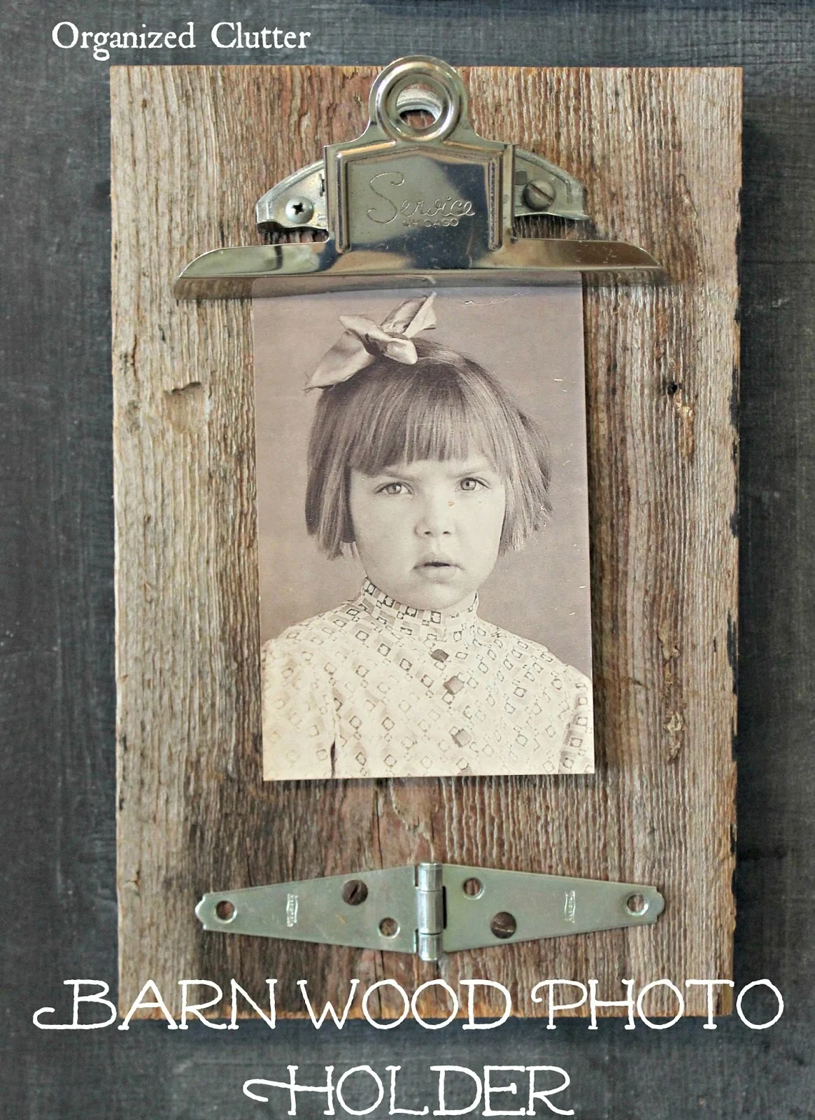 Repurposed Clipboard Photo Display On Barn Wood www.organizedclutter.net