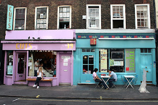 Colourful shop windows in a typical Soho backstreet in London