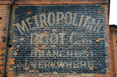 Tottenham Seven Sisters West Green Road ghost sign Metropolitan boot company