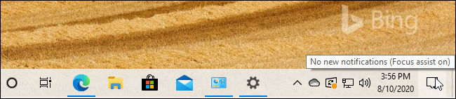 رسالة تلميح حول "Focus Assist on" من شريط مهام Windows 10.