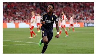 UCL: Vinicius Jr’s Double Earns Real Madrid 2-2 Draw at Bayern Munich
