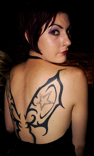 women tribal tattoos. Tribal Tattoo Girl back tattoo