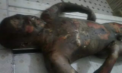 Graphic photos: Military officer 'mistaken' for armed robber lynched and burnt to death by mob in Ghana