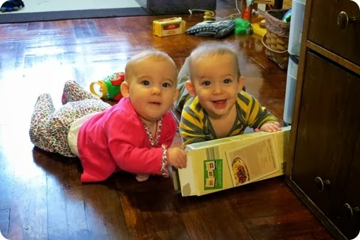 Twins playing with recylcing Boxes