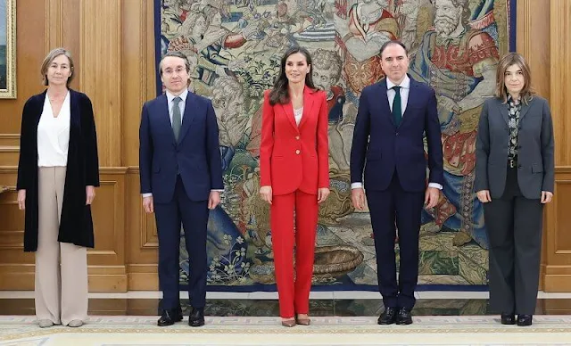 Queen Letizia wore a fuchsia, pink, red blazer suit by Carolina Herrera. Patrizia Pepe pumps, Gold and Rose earrings