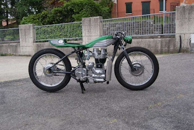 Royal Enfield ~ Minimalist design motorcycle  Named Skinny lizard by the builders At Alambiccus Garage Motorcycles . quite a different style of custom motorcycle