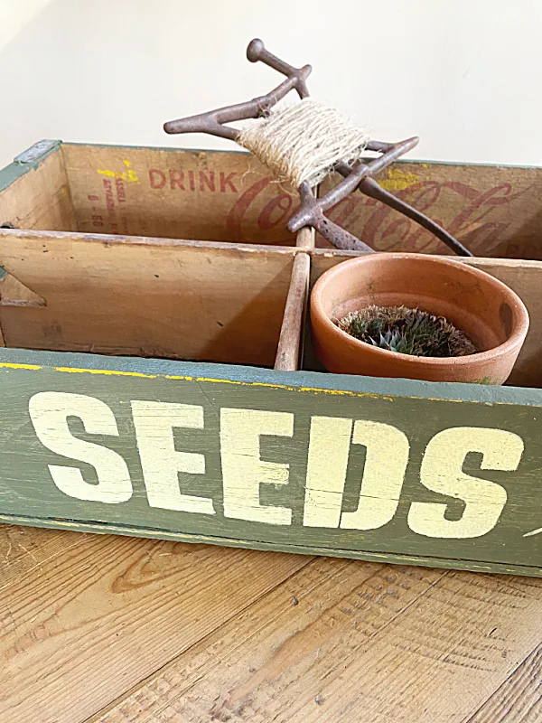 seed crate with pot and string holder