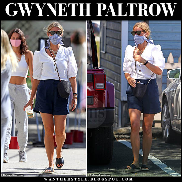 Gwyneth Paltrow wearing white top and blue striped face mask
