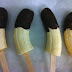 Frozen chocolate “Choc-Top” banana on a stick