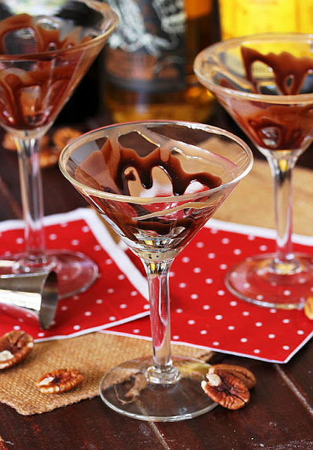 Chocolate and Caramel Syrup Drizzle Inside Martini Glass Image