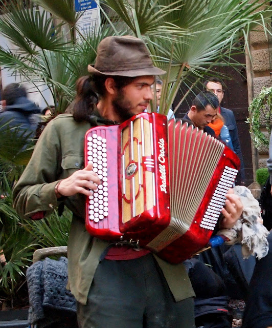 barcelona young man playing accordion