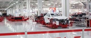 Tesla assembly line (Credit: Tesla) Click to Enlarge.