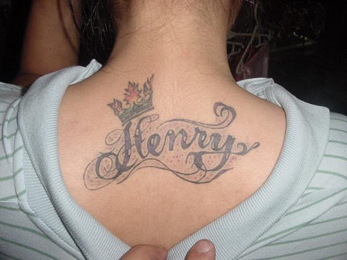 My wife's tattoo is of a rose and a ribbon with our children's names