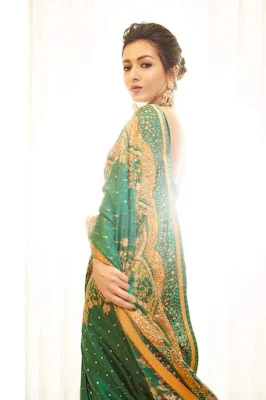 Actress Catherine Tresa Alexander in green saree Photoshoot