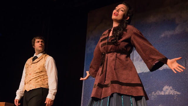 USU medical student, Ensign Margaret Black performs one of her favorite roles as Violetta in Verdi's “La Traviata” with Delaware Valley Opera in summer 2014, with tenor Scott Ingham.  (Credit: Kent Fairfield)