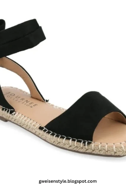 A pair of black Espadrilles