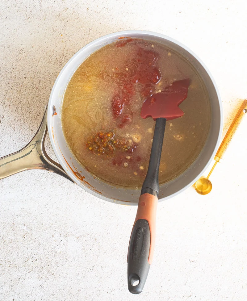 All the ingredients in a deep sauce pot ready to be boiled.