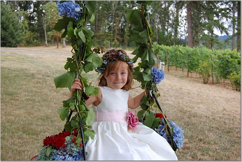 If you're having an outdoor wedding consider decorating a wooden swing and