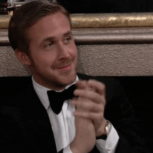 Ron Gosling clapping reaction Gif at an awards show
