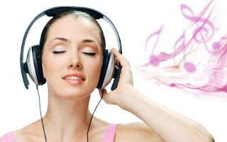 Woman listening to earphones