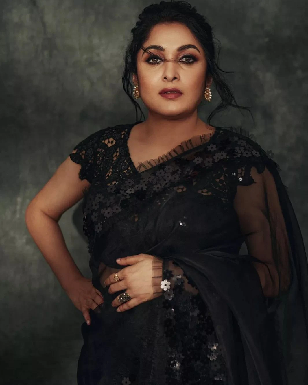 Actress Ramya krishnan black transparent saree Pics