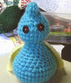 http://translate.google.es/translate?hl=es&sl=en&tl=es&u=http%3A%2F%2Fgreenyarncrochet.wordpress.com%2Fpatterns%2Fcritters%2Fcurly-critter%2F