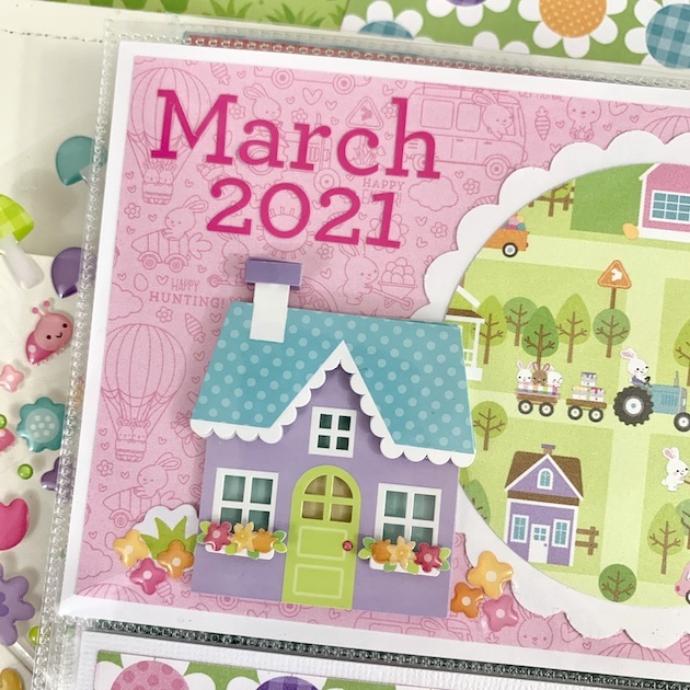 8x8 Spring scrapbook pages with a cute purple house and flowers