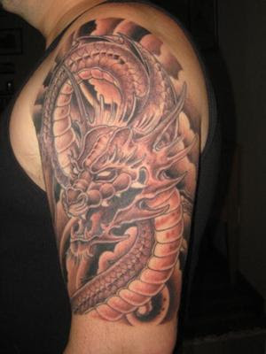 The dragon tattoos which are carved in Japanese style show dragons without 