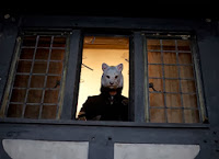 Fox mask in window in You're Next
