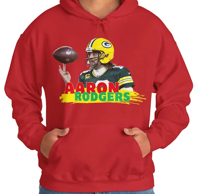 A Hoodie With NFL Player Aaron Gazing The Duke Which He Has Put On Tip of First Two Fingers