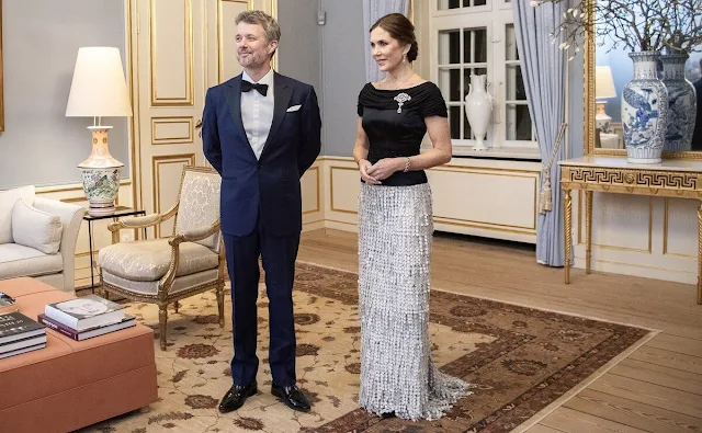 King Frederik and Queen Mary held a state dinner. Prime Minister Mette Frederiksen attended dinner. By Malene Birger skirt