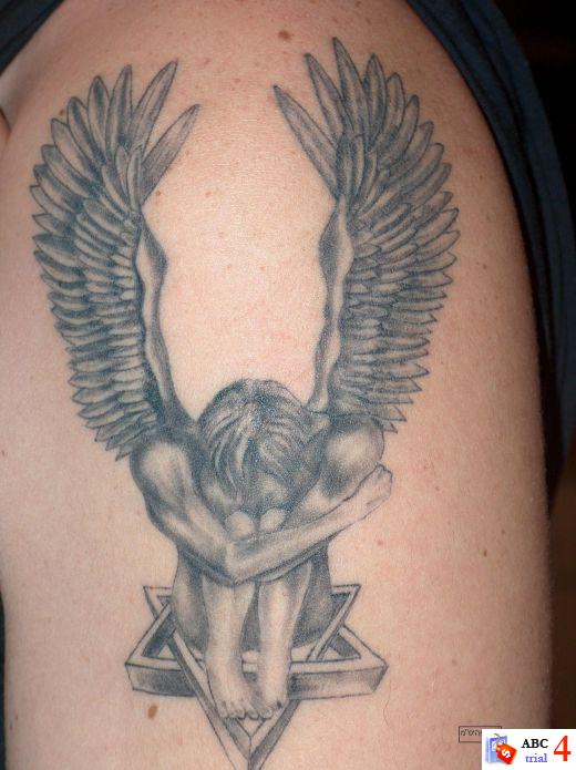 Tribal Wings and Sun Tattoo Picture Tribal cross angel wings