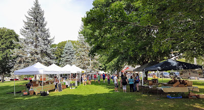 two rows of vendors at the Franklin Farmers Market