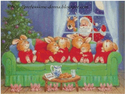 Schemi per il punto croce gratis: Babbo Natale con i coniglietti, lo schema è...