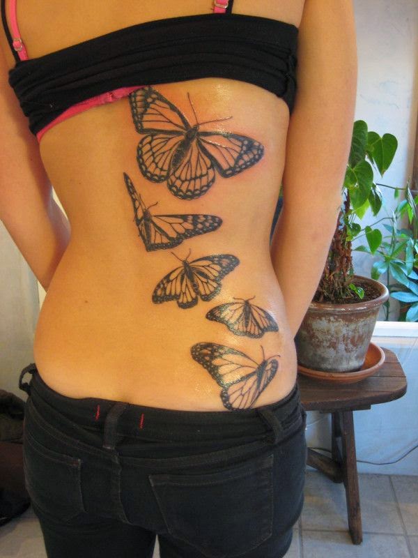 Butterfly Decorative Tattoos for Women, Women tattooed her back with Butterfly Designs, Eye Catching Butterfly Tattoos, Tattoos of Awesome butterflies on Back.