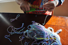 Practice cutting monster hair to build fine motor skills