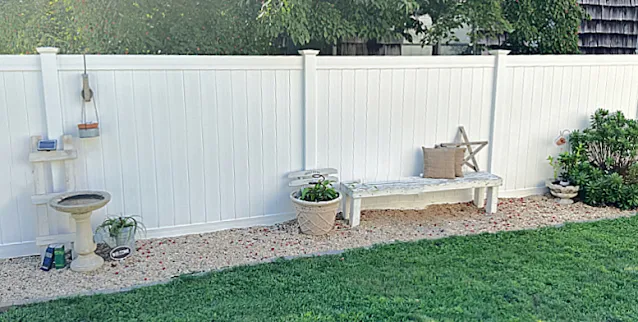 fenced rock garden area