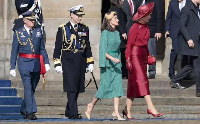 Queen Maxima wore a spain red top and skirt by Natan. Queen Letizia wore a jade green tweed dress by Moises Nieto