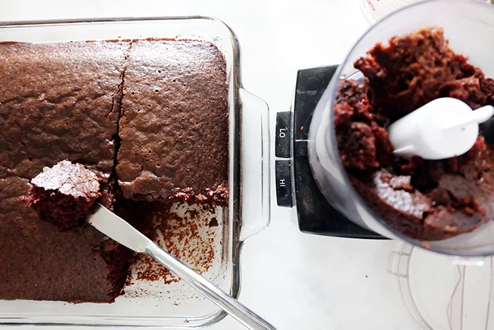 chocolate cake going into mini food processor