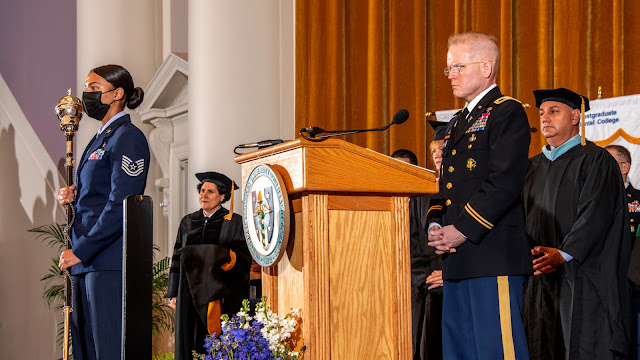 Air Force Tech Sgt. Karlena Perkins was the Uniformed Services University of the Health Sciences (USU) Service Member of the year for 2021 and recently was the “mace bearer” during this year’s 43rd annual university commencement ceremony. (Photo credit: Tom Balfour, USU)