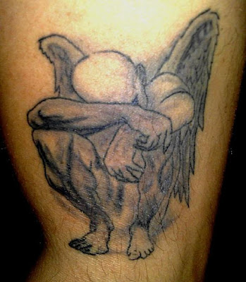 tribal tattoos - pictures half angel half demon tattoo