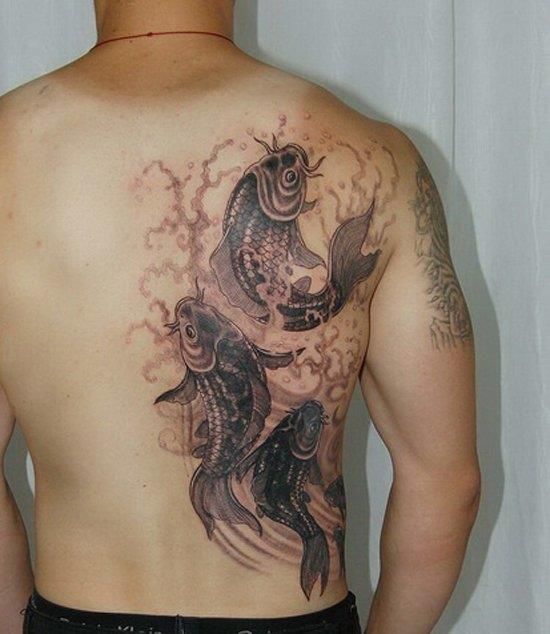 black-ink-koi-fishes-back-tattoo