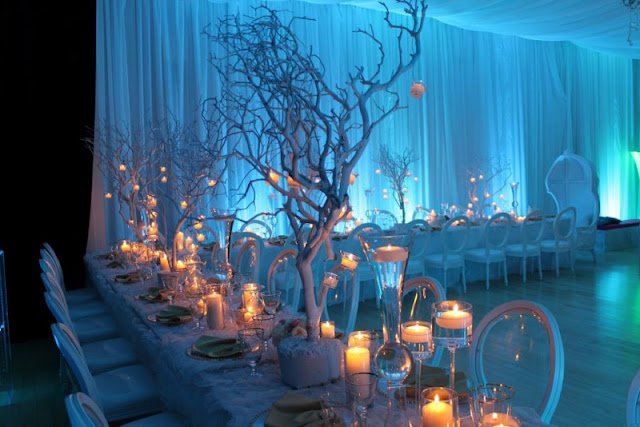dazzling-snowy-wedding-reception-decoration-ideas-with-dried-tree-centerpieces-and-hanging-candles