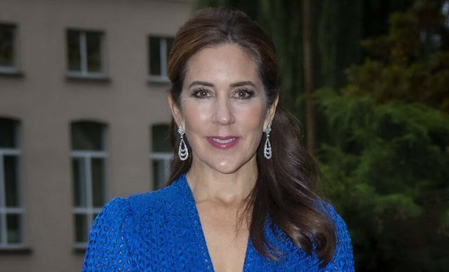 Crown Princess Mary wore a willow cobalt dress by Cult Gaia. Prada blue satin clutch. Diana Nausėdienė