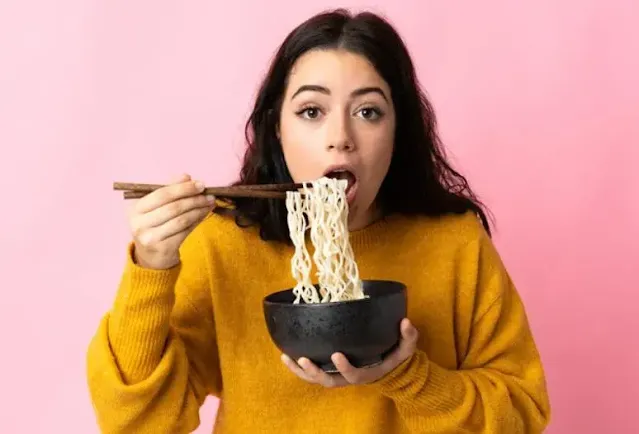 A Girl Eating Healthy Gluten-Free Ramen