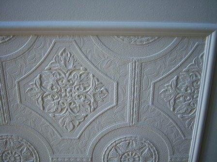Textured Wallpaper on Faux Carved Wainscoting Using Paintable Textured Wallpaper