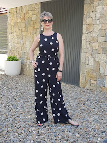 BLACK AND WHITE POLKA DOT JUMPSUIT