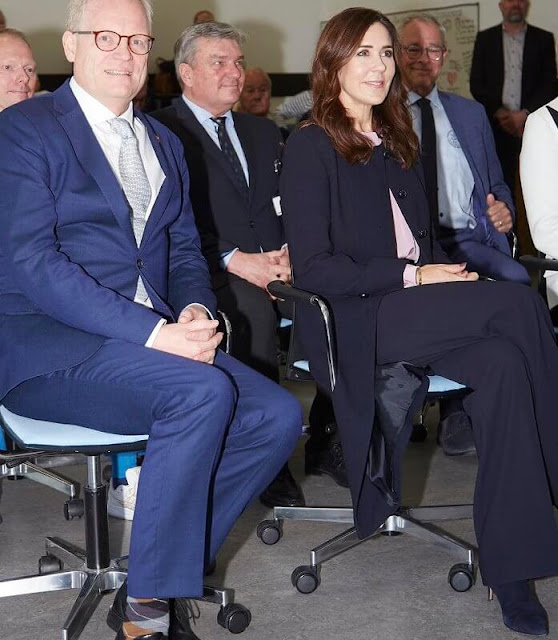 Crown Princess Mary wore a navy Hampton wool crabe coat by Jane Atelier, Goat. Hugo Boss Banora lavender pleat neck silk blouse